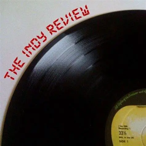 "The Indy Review" publication's logo: A vinyl with the name following the edge of the record.